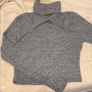 Grey cropped turtleneck with cutout